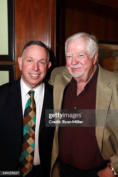 Kennedy Center President Michael M. Kaiser and cast member David Sabin pose during the party for the opening night performance of "Follies" at Center...