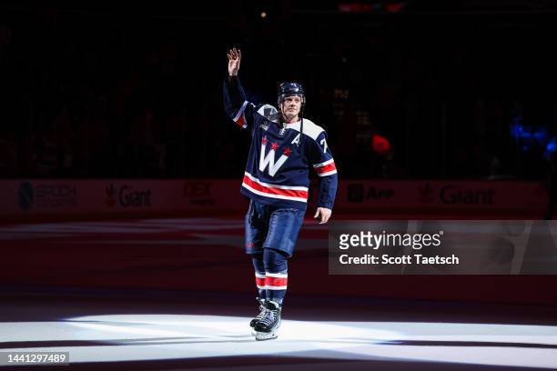 John Carlson of the Washington Capitals is recognized on the ice after the game against the Tampa Bay Lightning at Capital One Arena on November 11,...