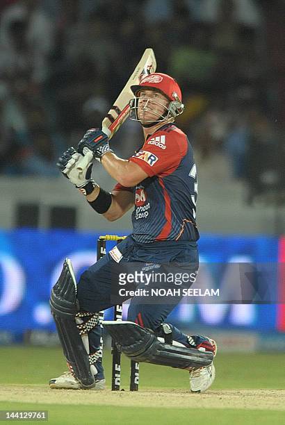 Delhi Daredevils batsman David Warner plays a shot during the IPL Twenty20 cricket match between the Deccan Chargers and Delhi Daredevils at Rajiv...