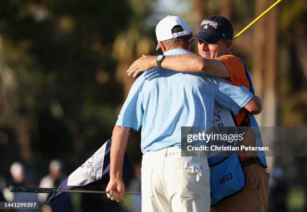 Steven Alker of New Zealand hugs caddie Sam Workman after winning the Charles Schwab Cup following the final round the Charles Schwab Cup...