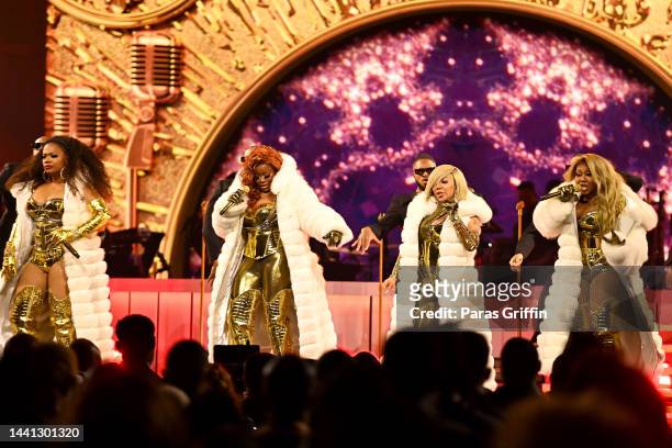 Kandi Burruss, Tamika Scott, Tameka Cottle and LaTocha Scott of Xscape perform onstage during the 2022 Soul Train Awards presented by BET at the...