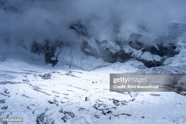 walking on glacier of manaslu, nepal - base camp stock pictures, royalty-free photos & images