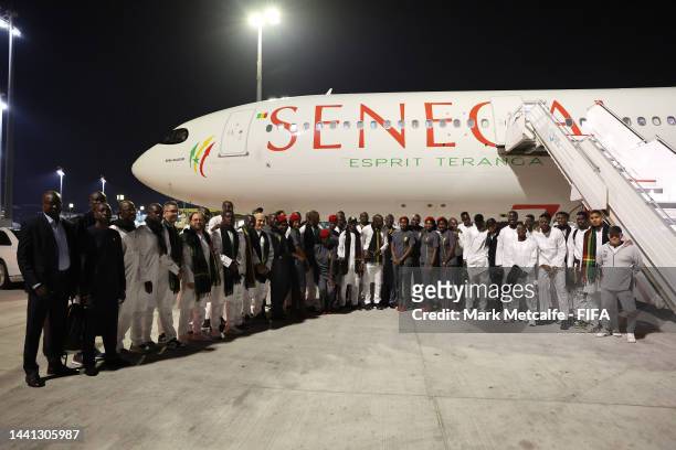 The national team of Senegal pose on the tarmac after arriving ahead of FIFA World Cup Qatar 2022 at Hamad International Airport on November 14, 2022...