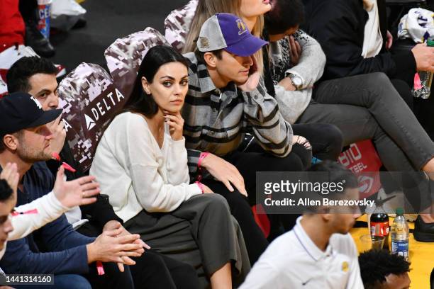 Mila Kunis and Ashton Kutcher attend a basketball between the Los Angeles Lakers and the Brooklyn Nets at Crypto.com Arena on November 13, 2022 in...