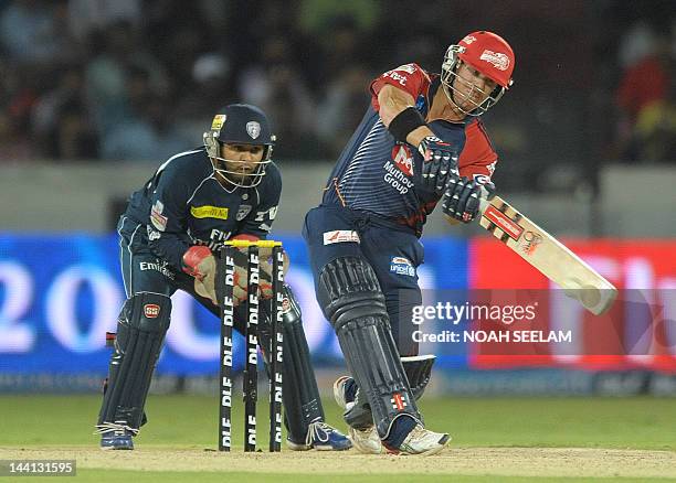 Delhi Daredevils batsman David Warner plays a shot during the IPL Twenty20 cricket match between the Deccan Chargers and Delhi Daredevils at Rajiv...