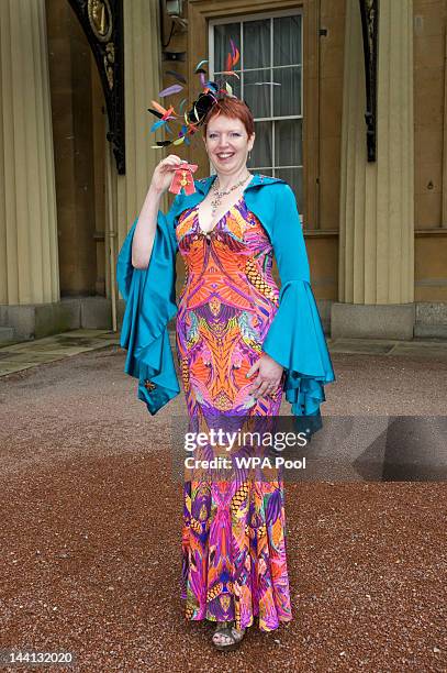Melanie Bryan after receiving her Officer of the British Empire medal from the Princess Royal at an Investiture ceremony at Buckingham Palace, May...