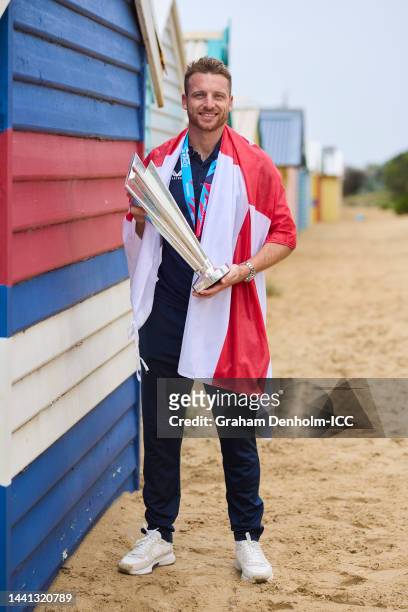 In this handout provided by the International Cricket Council, Jos Buttler the captain of England poses with the T20 World Cup Trophy after England...