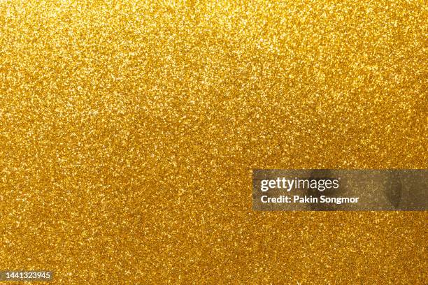 gold paper sheet texture cardboard background. - gold background stock-fotos und bilder