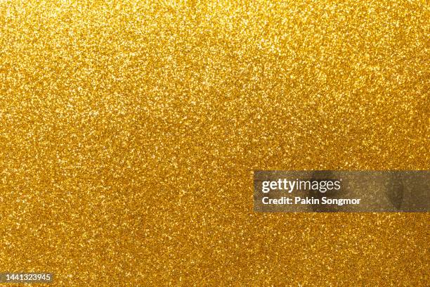 gold paper sheet texture cardboard background. - goud beschrijvende kleur stockfoto's en -beelden