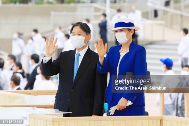 Emperor Naruhito and Empress Masako wave to well-wishers during the Yutakana-Umizukuri-Taikai, or meeting on fertilizing the sea on November 13, 2022...