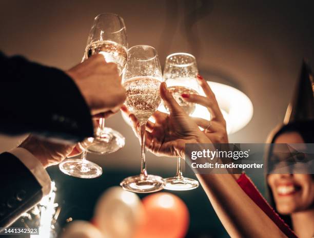 birthday celebration with champagne - sparkling wine stockfoto's en -beelden