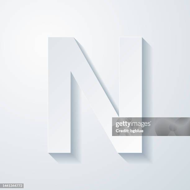 letter n. icon with paper cut effect on blank background - n white background stock illustrations