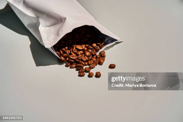 a pack of coffee beans. - caffettiera foto e immagini stock