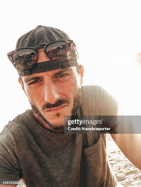 man portrait with backlight at dusk - profile picture stock pictures, royalty-free photos & images