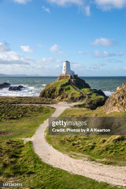 twr mawr lighthouse, ynys llanddwyn, anglesey, wales - headland stock pictures, royalty-free photos & images