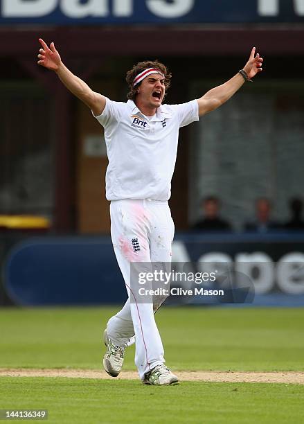 Jack Brooks of England Lions appeals sucessfully for the wicket of Kemar Roach of West Indies during day one of the tour match between England Lions...