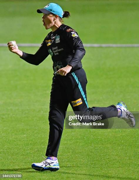 Amelia Kerr of the Brisbane Heat celebrates catching Darcie Brown of the Adelaide Strikers to win the game during the Women's Big Bash League match...