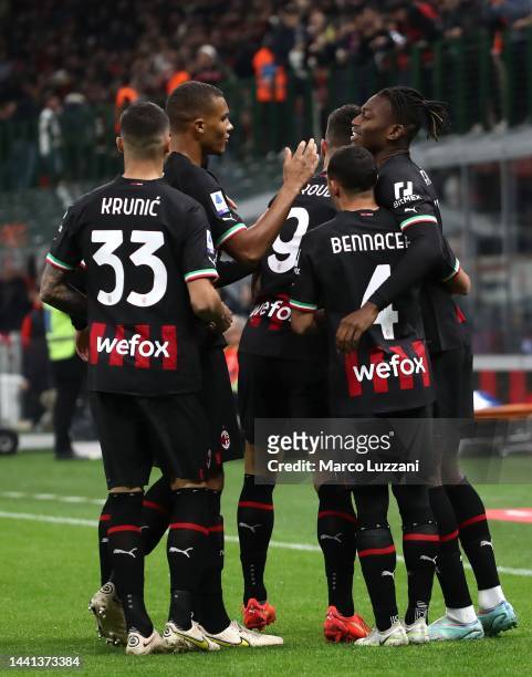 Rafael Leao of AC Milan celebrates after scoring the opening goal with his team-mates during the Serie A match between AC Milan and ACF Fiorentina at...