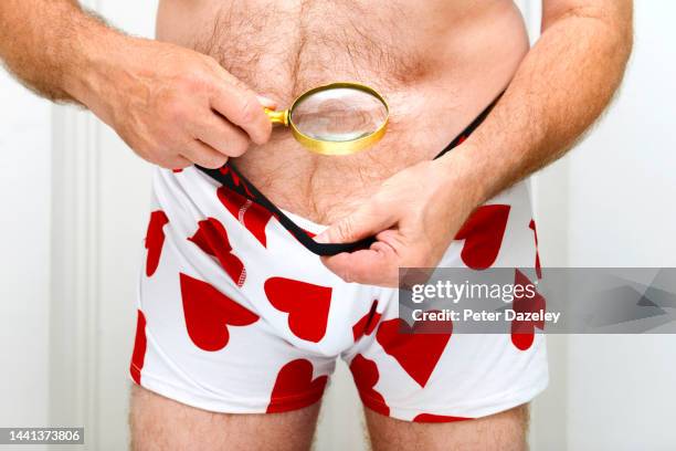 man in boxer shorts with illness - vph fotografías e imágenes de stock