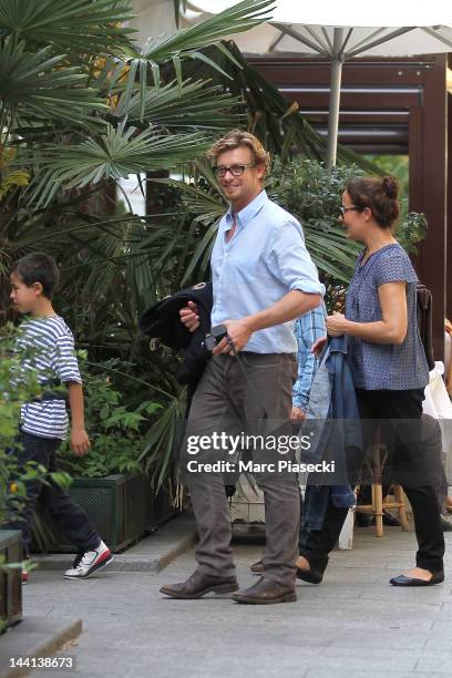 Actor Simon Baker, wife Rebecca Rigg and their chidren leave the 'La Cigale Recamier' restaurant on May 10, 2012 in Paris, France.