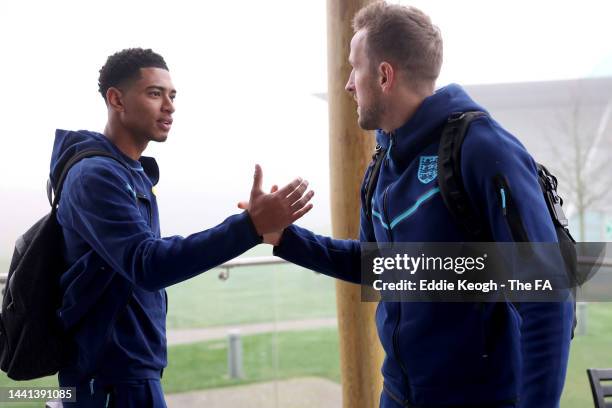 Jude Bellingham and Harry Kane of England arrive at St George's Park on November 14, 2022 in Burton upon Trent, England.