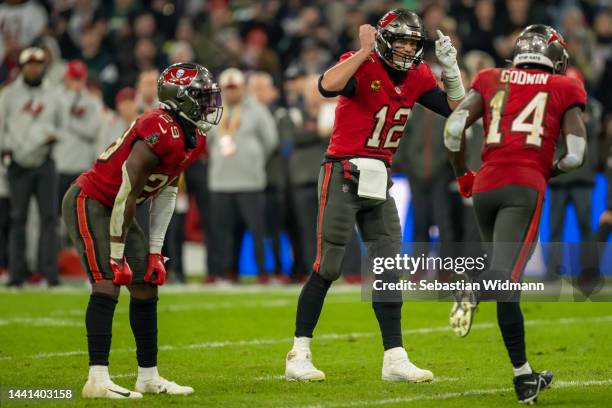 Tom Brady of the Tampa Bay Buccaneers talks to his team mates during the NFL match between Seattle Seahawks and Tampa Bay Buccaneers at Allianz Arena...