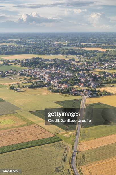 aerial view of cultivated land and town - belgium aerial stock pictures, royalty-free photos & images