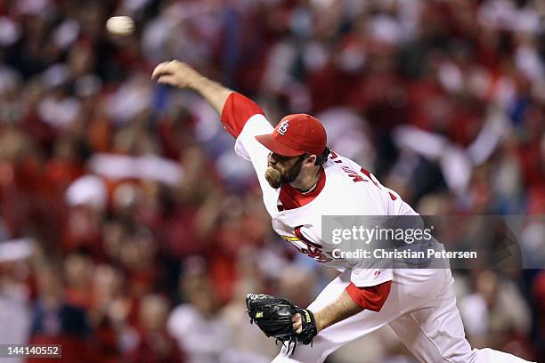 Jason Motte of the St. Louis Cardinals throws a pitch against the Milwaukee Brewers during Game Three of the National League Championship Series at...