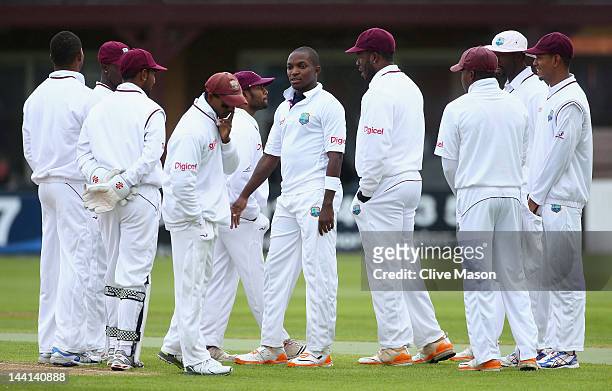 Fidel Edwards of West Indies celebrates after dismissing Joe Root of England Lions during day one of the tour match between England Lions and West...