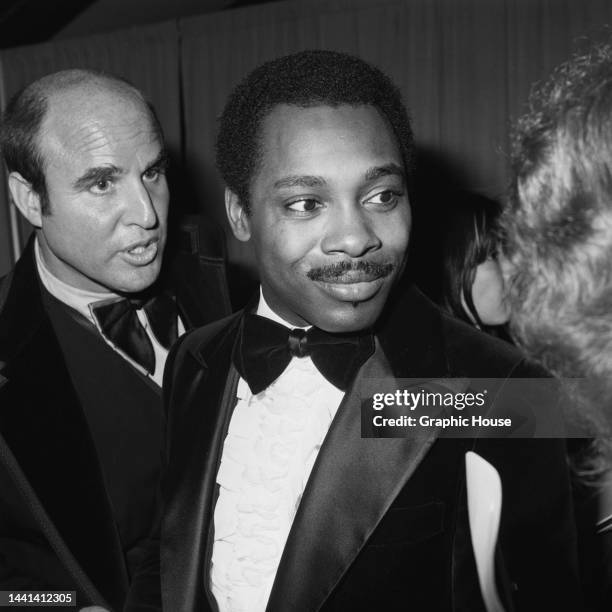 American singer, songwriter and musician George Benson attends the 19th Annual Grammy Awards, held at the Hollywood Palladium in Los Angeles,...