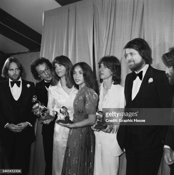 American singer, songwriter and musician Carl Wilson , American pop group Starland Vocal Band with their Grammy awards beside American singer,...