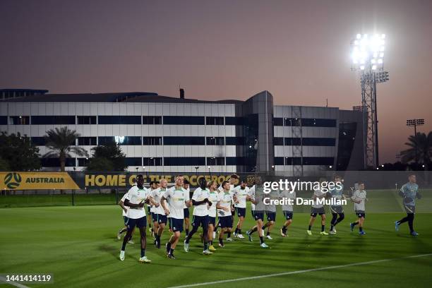 The Australia players warm up during a training session at AspireZoneTraining Facilities on November 14, 2022 in Doha, Qatar.