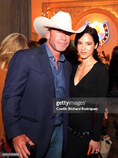 Taylor Sheridan and Kelsey Asbille attend the premiere for Paramount Network's "Yellowstone" Season 5 at Hotel Drover on November 13, 2022 in Fort...