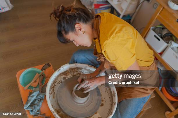 potter making bowl on wheel - earthenware stock pictures, royalty-free photos & images