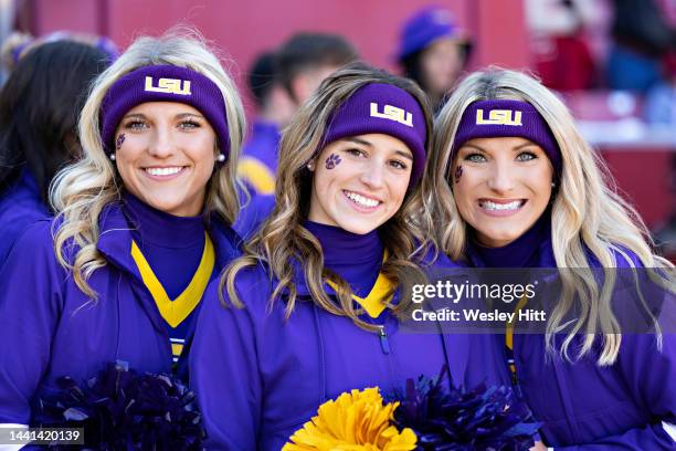 Cheerleaders of the LSU Tigers pose for the camera before a game against the Arkansas Razorbacks at Donald W. Reynolds Razorback Stadium on November...