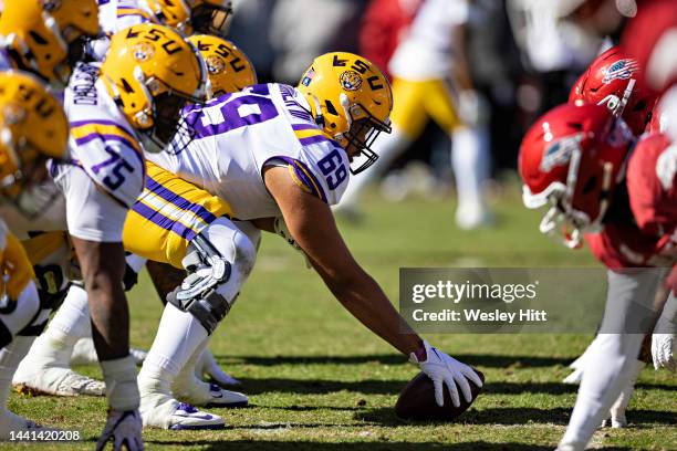 Charles Turner of the LSU Tigers prepares to snap the ball during a game against the Arkansas Razorbacks at Donald W. Reynolds Razorback Stadium on...