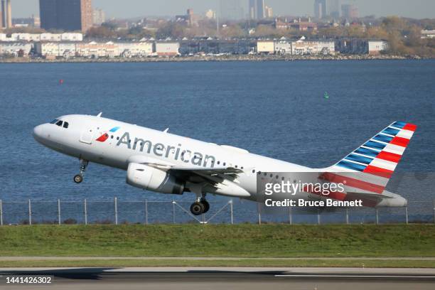 An American Airlines jet takes off at Laguardia AIrport on November 10, 2022 in the Queens borough of New York City. The airline industry has...