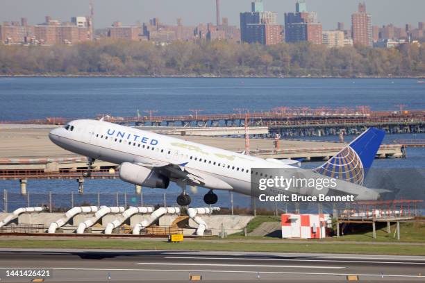 United Airlines jet takes off at Laguardia AIrport on November 10, 2022 in the Queens borough of New York City. The airline industry has rebounded...