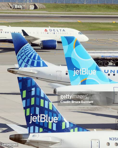 Airplanes from Delta, United and JetBlue populate the taxiway at Laguardia AIrport on November 10, 2022 in the Queens borough of New York City. The...