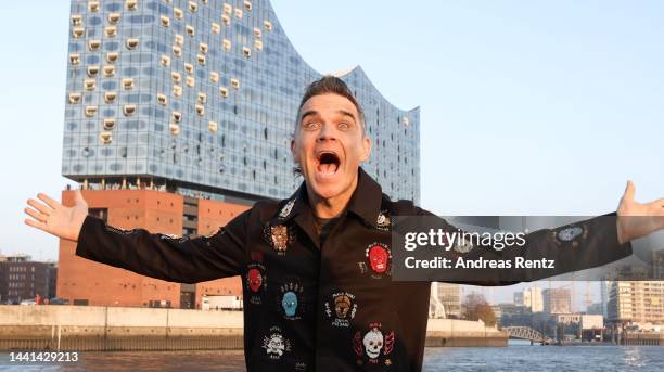 Robbie Williams attends a photocall ahead of his Telekom Street Gigs concert on November 14, 2022 in Hamburg, Germany. Robbie Williams will perform...