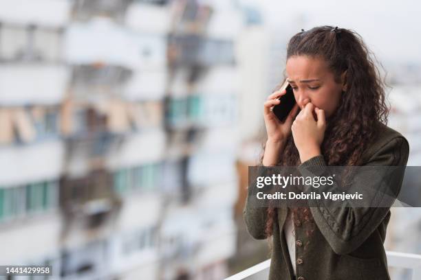 sad business woman having phone conversation - job search stress stock pictures, royalty-free photos & images