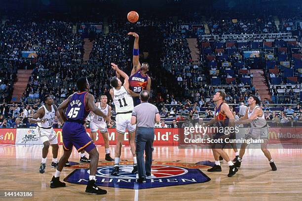 Oliver Miller of the Phoenix Suns battles for the jumpball against Buckler Bologna as part of the 1993 McDonald's Championships on October 23, 1993...