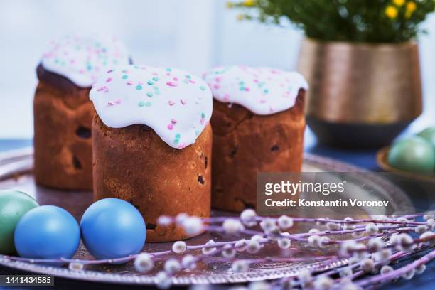 orthodox easter, palm sunday concept. easter cakes (kulich), willow branches, painted eggs. selective focus. - easter morning ressurection stock-fotos und bilder