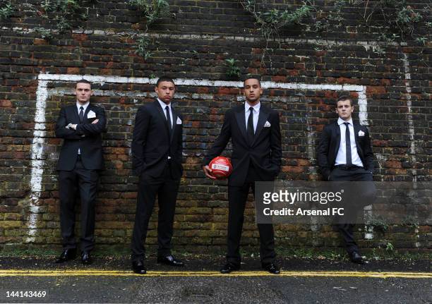 In this handout photo provided by Arsenal FC, Thomas Vermaelen, Alex Oxlade-Chamberlain, Theo Walcott and Jack Wilshere before the Arsenal Charity...