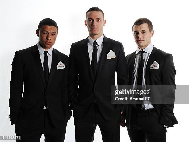 In this handout photo provided by Arsenal FC, L-R Alex Oxlade-Chamberlain, Thomas Vermaelen and Jack Wilshere before the Arsenal Charity Ball at...