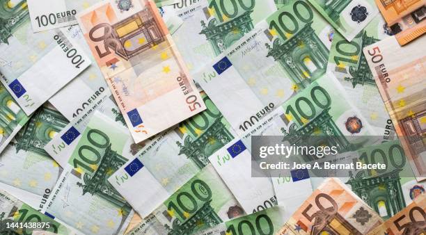 full frame of 50 and 100 euro bills. - euroscheine stock-fotos und bilder