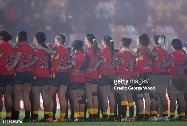 Players of Papua New Guinea line up for the National Anthems ahead of the Women's Rugby League World Cup Semi-Final match between Australia and Papua...