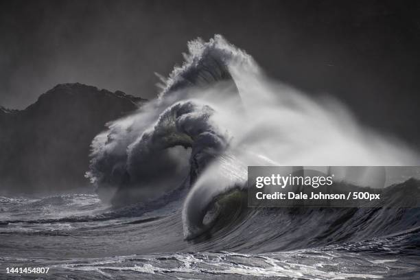 scenic view of sea waves against sky,cape disappointment,washington,united states,usa - big wave stock pictures, royalty-free photos & images