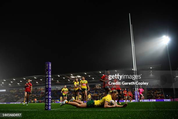 Shenae Ciesiolka of Australia goes over for a try during the Women's Rugby League World Cup Semi-Final match between Australia and Papua New Guinea...