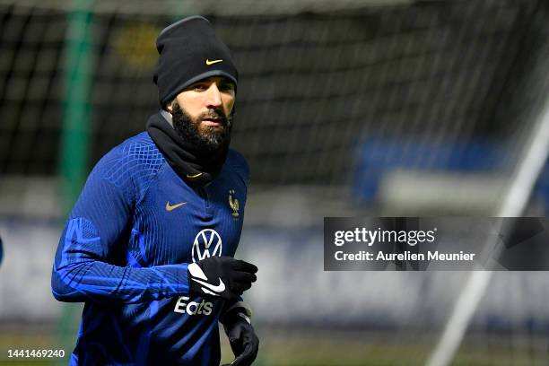 Karim Benzema warms up during a french soccer team training session at Centre National Du Football on November 14, 2022 in Etival-Clairefontaine,...